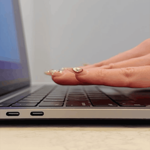 GIF of before and after tippy type with hands with nails typing